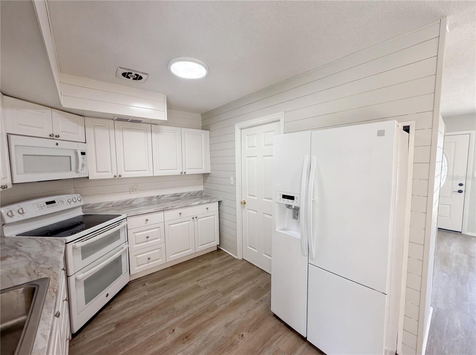 Photo 6 of 7328 TANGELO AVE
